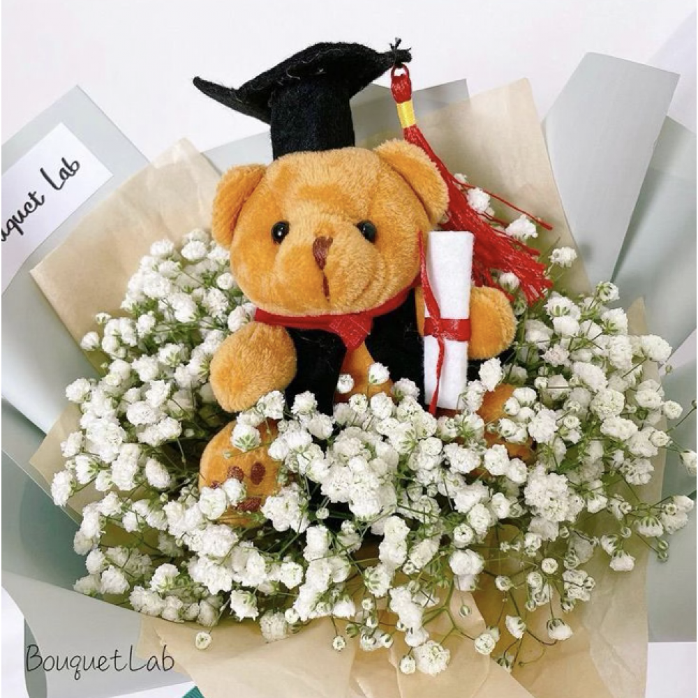 ⁠⁠Baby breath + Graduation bear bouquet with blue wrapper = $80 each